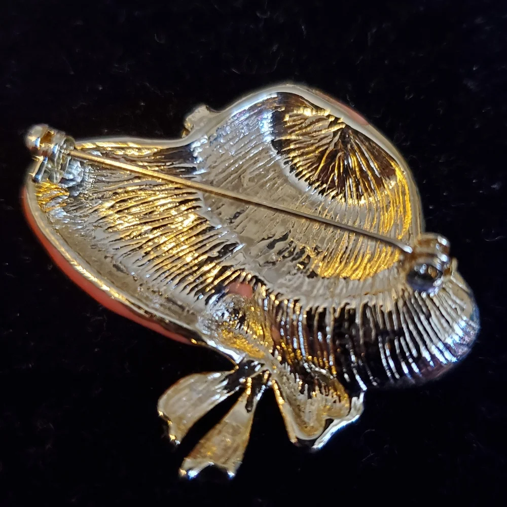 Goldtone and pink enamel hat brooch with bow and flowers